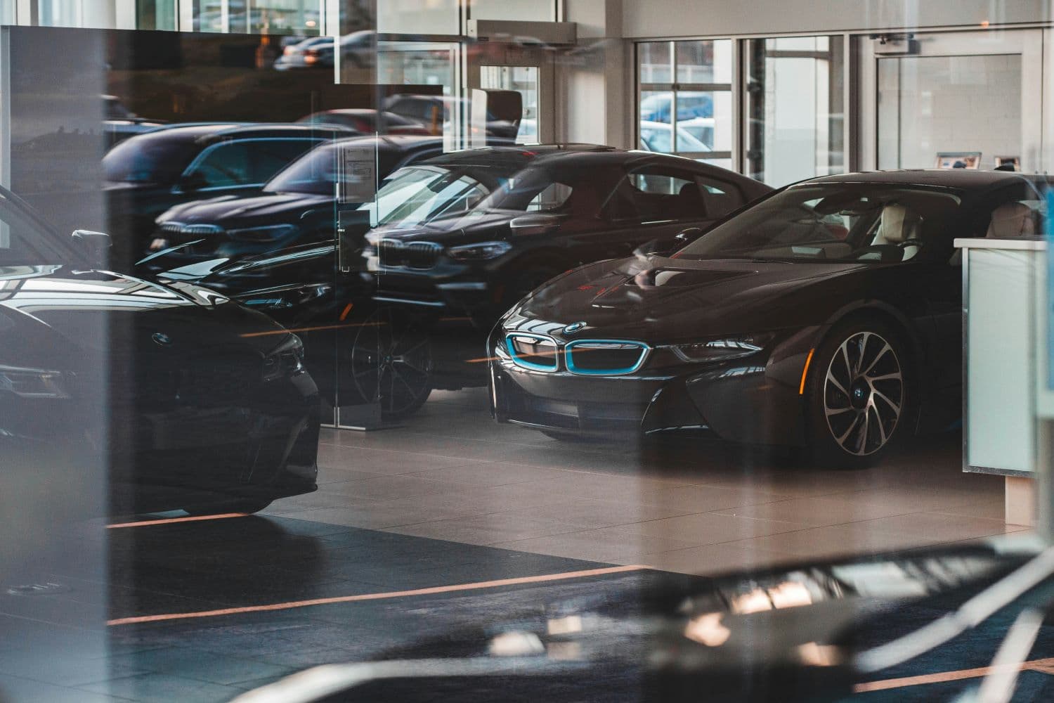 Hawya team members with rental cars